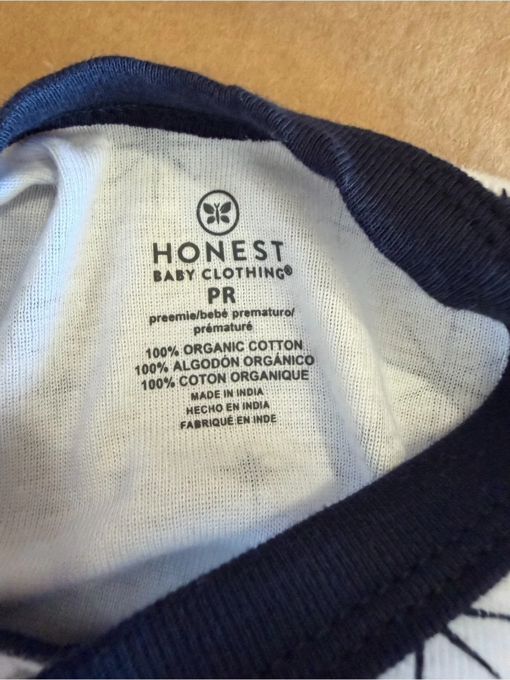 Honest Baby Preemie Star-Print Wrap Bodysuit in White with Navy Trim